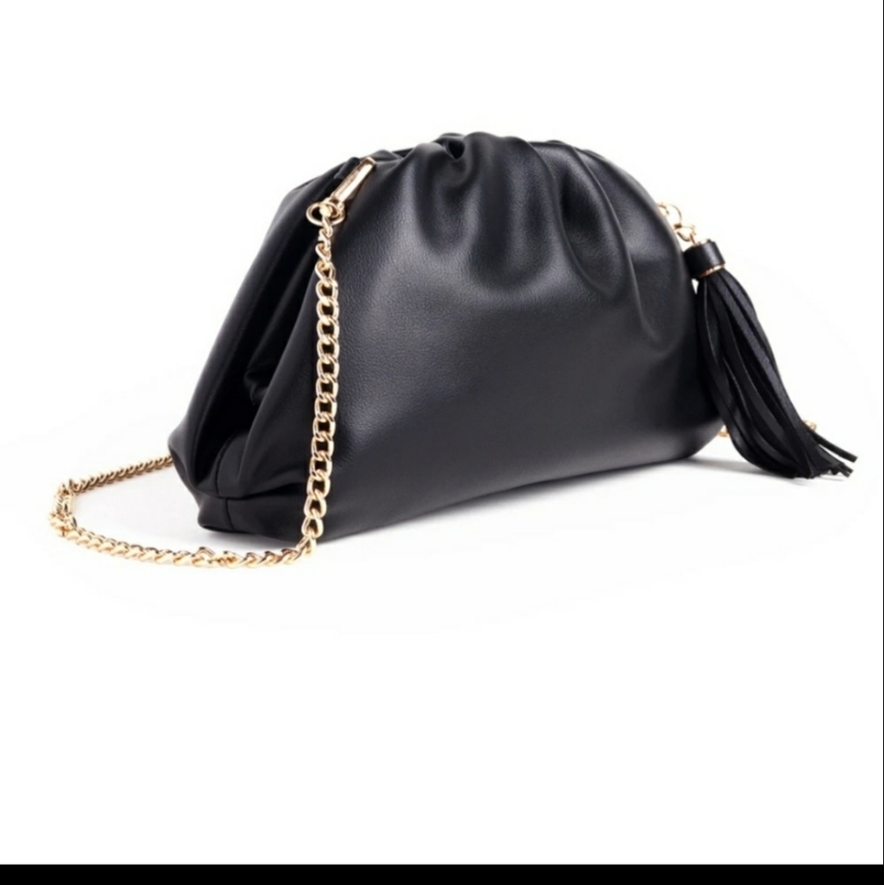 Rachel Zoe/ understated leather... Crescent clutch